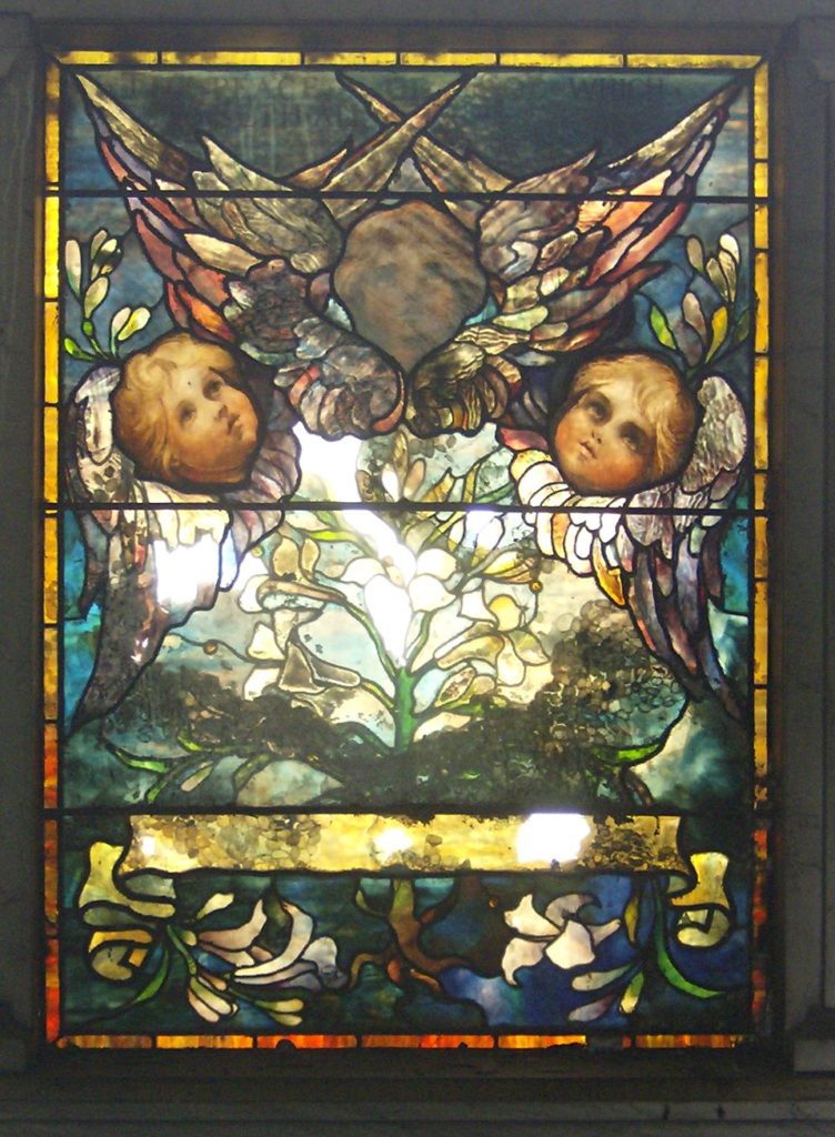 Stained glass with cherubs