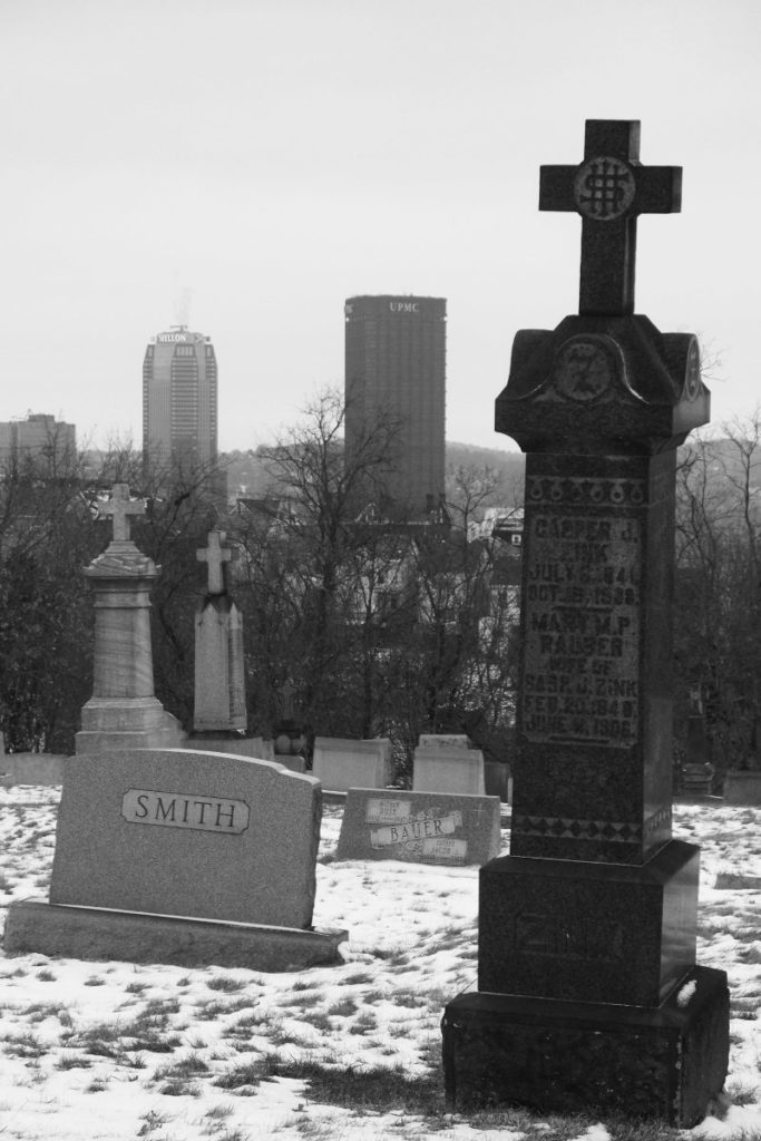 St. Michael’s Cemetery, with skyscrapers in the background