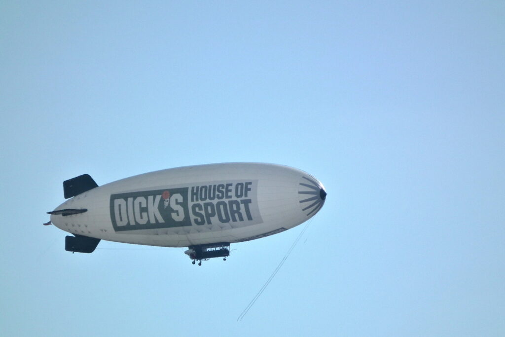 Blimp advertising Dick’s House of Sport flying over downtown Pittsburgh