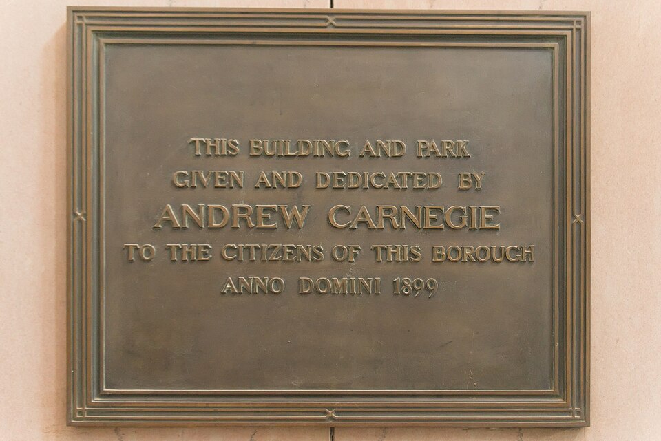 Plaque: This building and park given and dedicated by Andrew Carnegie to the citizens of this borough, anno domini 1899
