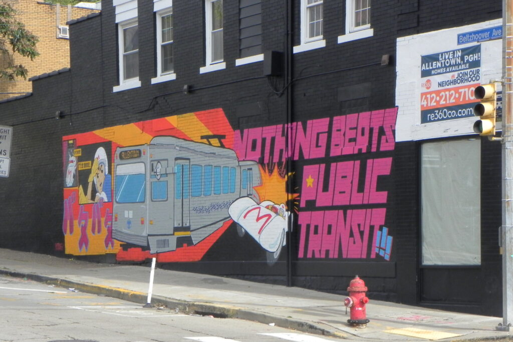 “Nothing beats public transit” on a mural