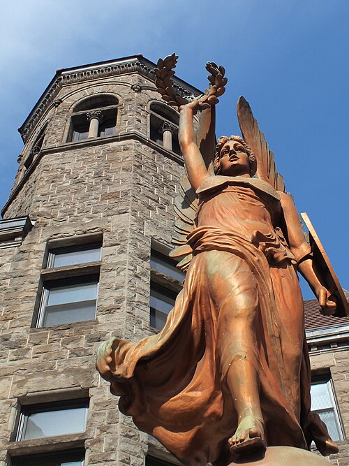 Looking up at the statue of Victory