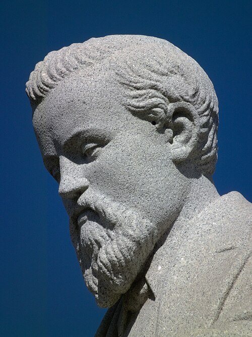 Close-up of the face on the Daniel O’Neill portrait statue