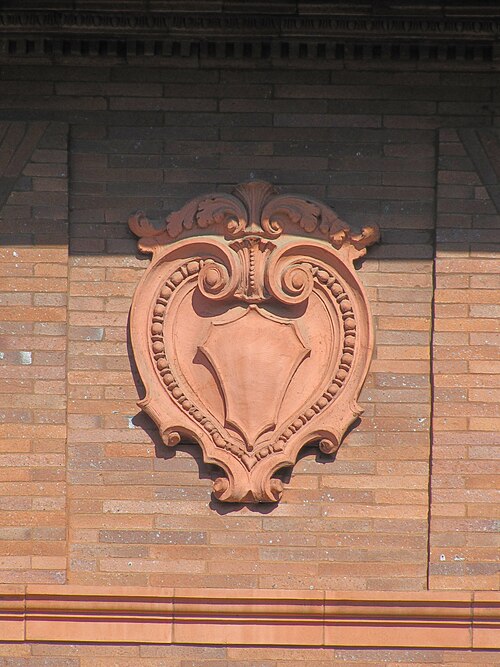 Terra-cotta shield on the Miller house