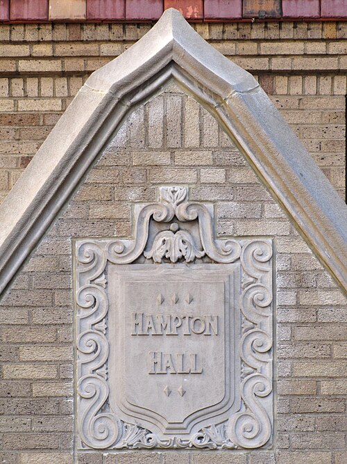 Shield with “Hampton Hall” in the center