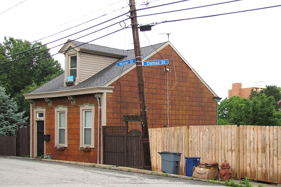 House clinging to the side of a hill