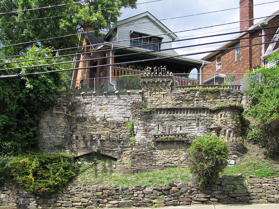 Retaining wall with house above