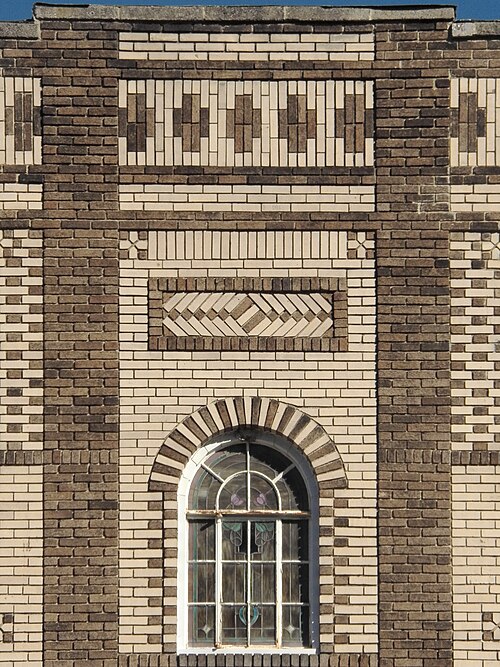 Window with colorful brickwork