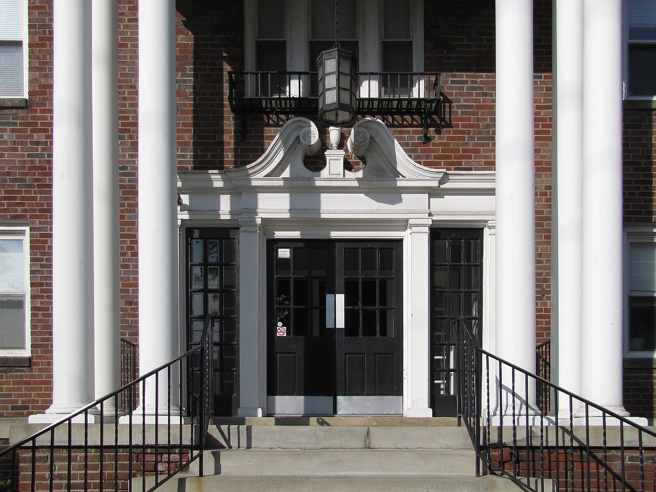 Entrance with broken pediment