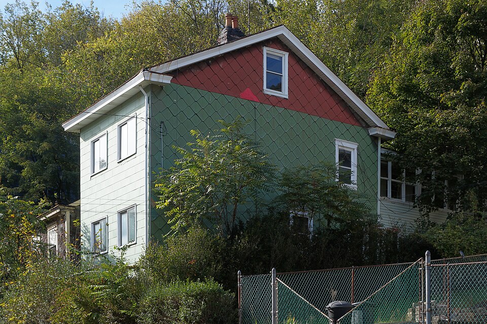House on High Street with asbestos siding