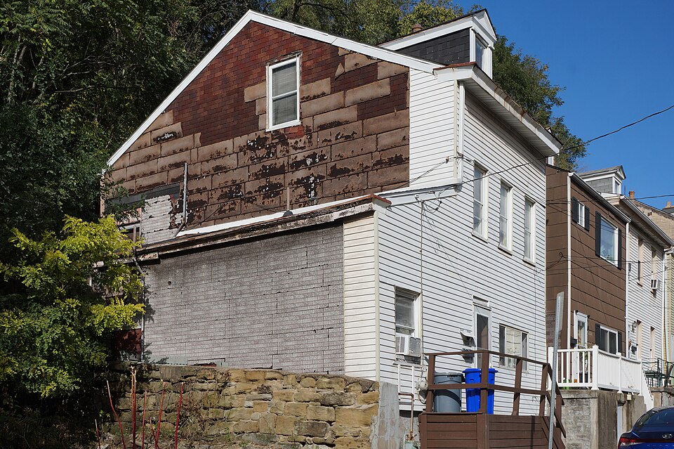 House on High Street with four kinds of siding