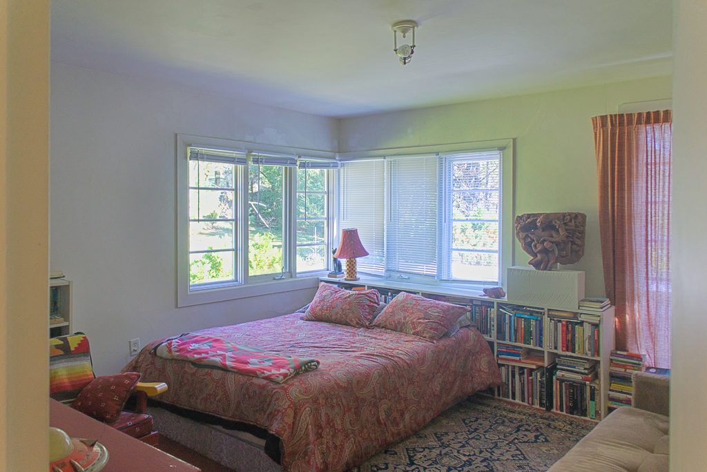 Bedroom with corner windows